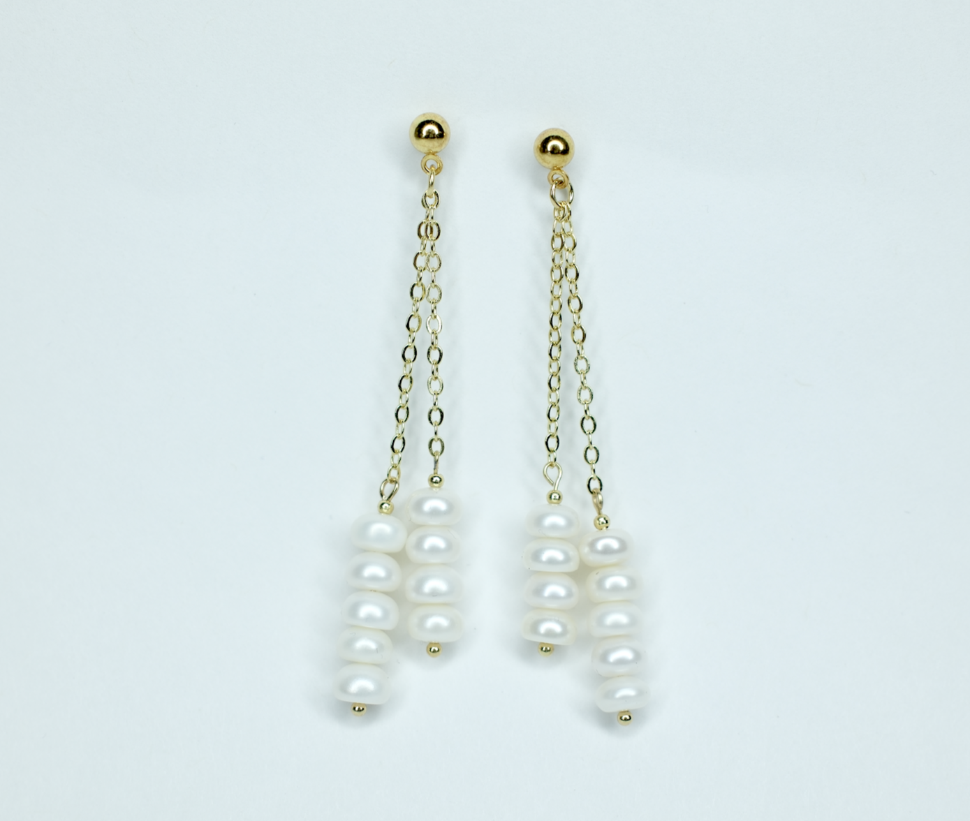 Long drop pearl earring